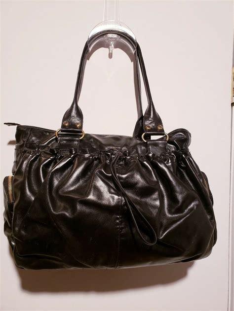 Sold by italianspice80. . Francesco biasia black leather handbag